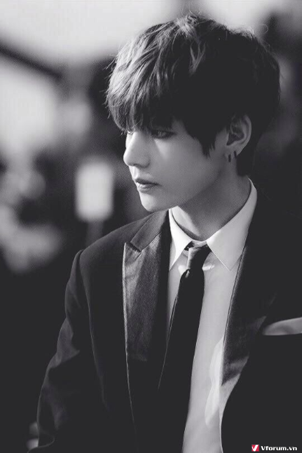Looking for a stunning wallpaper for your phone or laptop? Look no further than the gorgeous black and white photos of V from BTS. His captivating gaze and suave demeanor will make for the perfect backdrop.